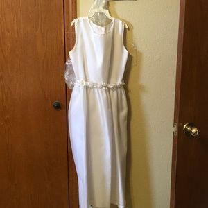 White wedding dress or communion dress.